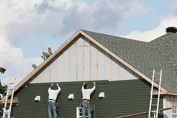 Professional Siding Contractor technician working in Avon, IN